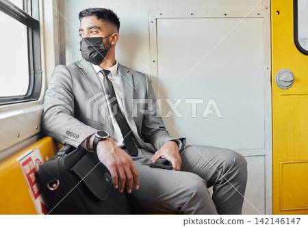 Health, mask and businessman with travel on train for public transport, trip and safety on journey. Professional person, ppe and thinking in vehicle with protection, briefcase and commute to work 142146147