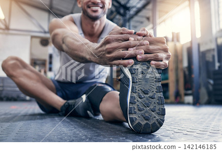 Fitness, foot and man with stretching at gym for exercise, warm up and performance on floor. Health club, training and legs of male person with preparation for workout, flexibility and cardio energy Fitness, foot and man with stretching at gym for exercise, warm up and performance on floor. Health club, training and legs of male person with preparation for workout, flexibility and cardio energy 142146185