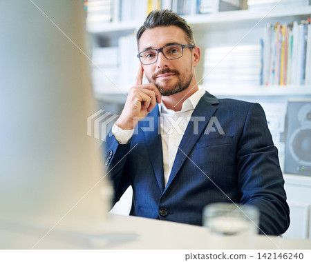 Portrait, confidence and business man at desk in office on computer for career or job in Germany. Face, professional and salesman in glasses, entrepreneur or corporate employee in suit at workplace Portrait, confidence and business man at desk in office on computer for career or job in Germany. Face, professional and salesman in glasses, entrepreneur or corporate employee in suit at workplace 142146240