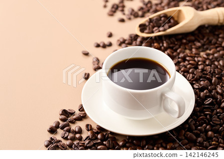 coffee poured into a cup coffee poured into a cup 142146245