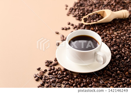 coffee poured into a cup coffee poured into a cup 142146249