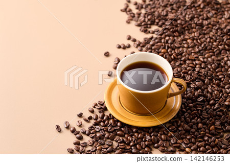 coffee poured into a cup coffee poured into a cup 142146253
