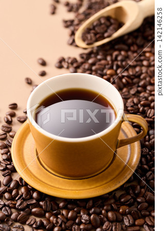 coffee poured into a cup coffee poured into a cup 142146258