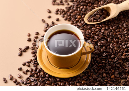 coffee poured into a cup coffee poured into a cup 142146261