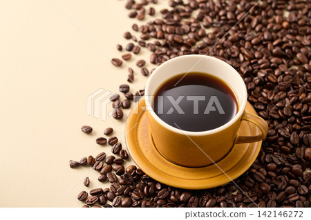 coffee poured into a cup coffee poured into a cup 142146272