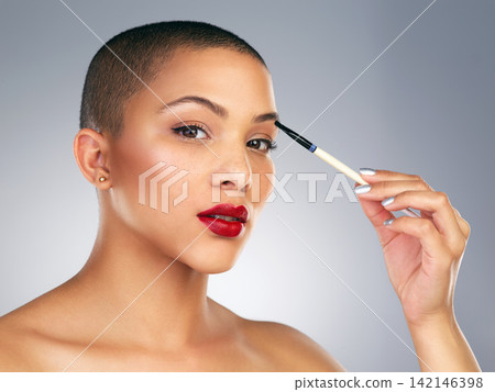 Eyeshadow, brush and portrait of woman with red lips in studio for lipstick and makeup routine. Cosmetics, beauty and face of female person with facial cosmetology treatment by gray background. Eyeshadow, brush and portrait of woman with red lips in studio for lipstick and makeup routine. Cosmetics, beauty and face of female person with facial cosmetology treatment by gray background. 142146398