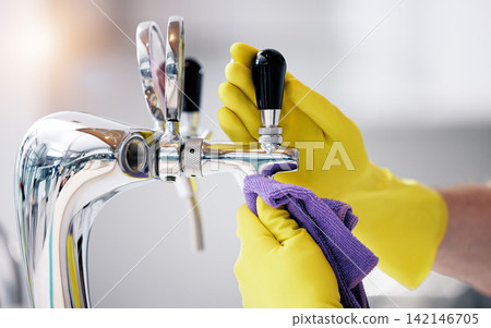 Bar, person or hands cleaning tap for shine in home for disinfection, cafe or kitchen in small business. Barista, wipe or closeup of cleaner with gloves or cloth for sanitary hygiene, dust and faucet Bar, person or hands cleaning tap for shine in home for disinfection, cafe or kitchen in small business. Barista, wipe or closeup of cleaner with gloves or cloth for sanitary hygiene, dust and faucet 142146705
