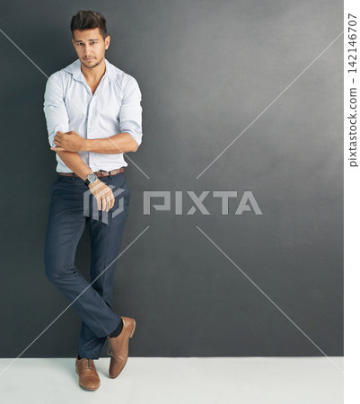Businessman, portrait and confident in studio background with fashion for entrepreneur, employee or professional. Male worker, serious and proud in formal wear for creative career, designer or editor Businessman, portrait and confident in studio background with fashion for entrepreneur, employee or professional. Male worker, serious and proud in formal wear for creative career, designer or editor 142146707