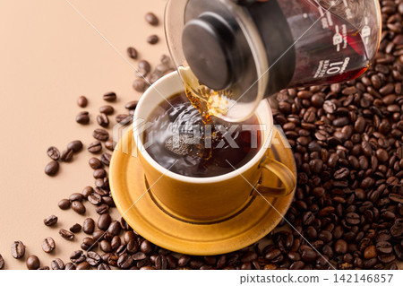 pour coffee into a cup pour coffee into a cup 142146857