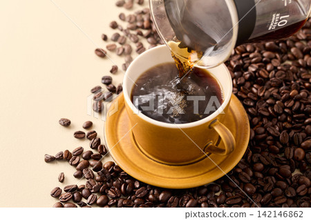 pour coffee into a cup pour coffee into a cup 142146862