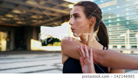Runner, woman and stretching after run with city background for fitness, health and exercise in town for summer. Female person, athlete and training in urban for marathon, competition and wellness Runner, woman and stretching after run with city background for fitness, health and exercise in town for summer. Female person, athlete and training in urban for marathon, competition and wellness 142146985