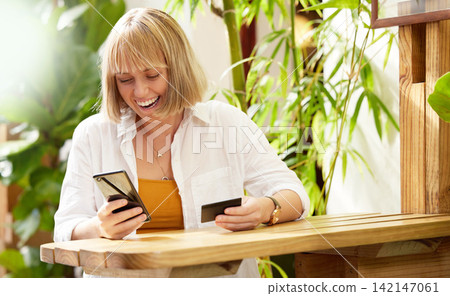 Woman, smartphone and credit card with smile, online shopping and ecommerce for retail sale. Shopper, cellphone and technology for store discount or purchase for consumer, bargain and spending Woman, smartphone and credit card with smile, online shopping and ecommerce for retail sale. Shopper, cellphone and technology for store discount or purchase for consumer, bargain and spending 142147061