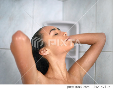 Woman, self care or shower washing hair for hygiene, cleaning or wellness and beauty. Female person, grooming and water with skincare in a bathroom for cosmetics, treatment and relaxing at home Woman, self care or shower washing hair for hygiene, cleaning or wellness and beauty. Female person, grooming and water with skincare in a bathroom for cosmetics, treatment and relaxing at home 142147106