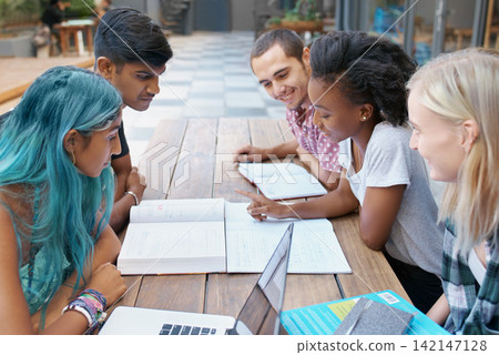 Students, group and reading outdoor at university with books, listening and learning for education on campus. Friends, gen z people and team research with study, diversity and smile by college table Students, group and reading outdoor at university with books, listening and learning for education on campus. Friends, gen z people and team research with study, diversity and smile by college table 142147128