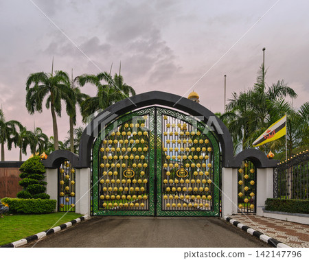 Ornate gold side entrance gate of Jame Asr Hassanil Bolkiah Mosque in Bandar Seri Begawan, Brunei Ornate gold side entrance gate of Jame Asr Hassanil Bolkiah Mosque in Bandar Seri Begawan, Brunei 142147796