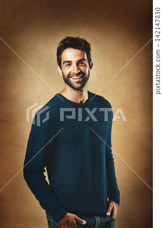 Portrait, happy and man in studio, fashion and warm in winter, confidence and sweater for aesthetic. Proud, person and background of wall, model and cool with minimalism, stylish and loungewear Portrait, happy and man in studio, fashion and warm in winter, confidence and sweater for aesthetic. Proud, person and background of wall, model and cool with minimalism, stylish and loungewear 142147830
