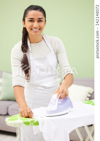 Woman, iron and laundry for portrait in home with smile, pride or cleaning with steam for wrinkles. Person, cleaner and happy with machine for clothes with housekeeping, board and fabric in apartment Woman, iron and laundry for portrait in home with smile, pride or cleaning with steam for wrinkles. Person, cleaner and happy with machine for clothes with housekeeping, board and fabric in apartment 142148072