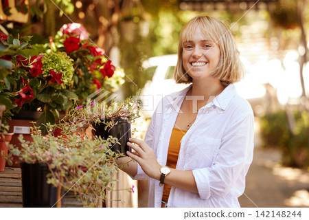 Woman, portrait and happy for plant shopping outdoor for garden design, agriculture and eco friendly. Customer, face and smile at shop for gardening, sustainability and organic hobby with confidence Woman, portrait and happy for plant shopping outdoor for garden design, agriculture and eco friendly. Customer, face and smile at shop for gardening, sustainability and organic hobby with confidence 142148244