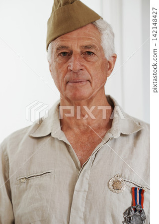 Senior person, army and veteran in portrait for memories, pride and respect in home for remembering. Mature man, war and hero in retirement with service, medals and uniform as soldier or patriot Senior person, army and veteran in portrait for memories, pride and respect in home for remembering. Mature man, war and hero in retirement with service, medals and uniform as soldier or patriot 142148427