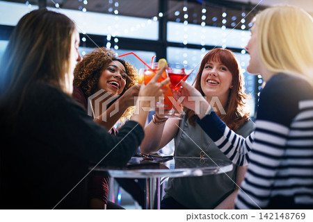 Friends, happy and cheers in club for party or event for nightlife, bonding and people with fun or laughter. Alcohol, toast and raising glasses with excitement for celebration, together and drink Friends, happy and cheers in club for party or event for nightlife, bonding and people with fun or laughter. Alcohol, toast and raising glasses with excitement for celebration, together and drink 142148769