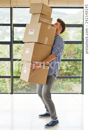 Man, moving and carry a pile of boxes in house with transport, delivery or home relocation. Lifting, package and person walking in apartment or real estate to rent with help of courier or support Man, moving and carry a pile of boxes in house with transport, delivery or home relocation. Lifting, package and person walking in apartment or real estate to rent with help of courier or support 142149145