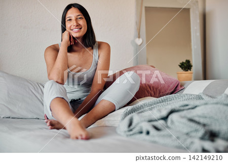 Young woman, portrait and relax in bed with smile for happy morning, healthy sleep or wellness weekend in home. Female person, fresh and wake up in house room for rest, comfort and lazy day or break Young woman, portrait and relax in bed with smile for happy morning, healthy sleep or wellness weekend in home. Female person, fresh and wake up in house room for rest, comfort and lazy day or break 142149210