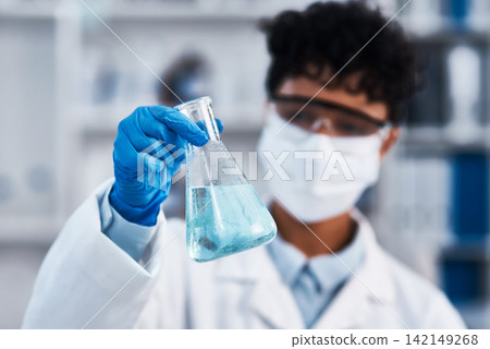 Science, woman and beaker in labratory for medical research, sample analysis and pharmaceutical innovation. Female scientist, healthcare and medicine breakthrough with chemical liquid for future 142149268