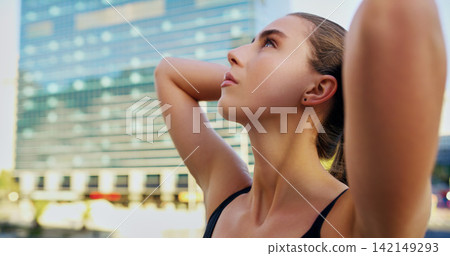 Woman, athlete and break after running in urban city for fitness, health and exercise in town for summer. Female person, runner and breathing in New York for marathon, competition and wellness Woman, athlete and break after running in urban city for fitness, health and exercise in town for summer. Female person, runner and breathing in New York for marathon, competition and wellness 142149293