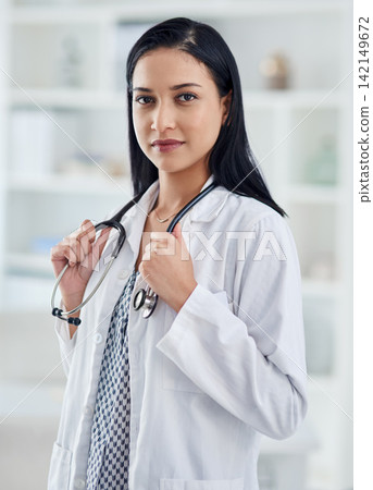Doctor, portrait and confident in hospital for cardiology, healthcare and medicare in clinic. Woman, cardiologist and positive attitude with stethoscope for integrity, pride and patient care in Peru 142149672