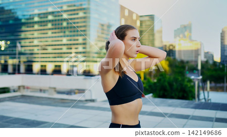 Woman, athlete and tired after run in urban city for fitness, health and exercise in town for summer. Female person, runner and training in Los Angeles for breathing, cardio and wellness with fatigue Woman, athlete and tired after run in urban city for fitness, health and exercise in town for summer. Female person, runner and training in Los Angeles for breathing, cardio and wellness with fatigue 142149686