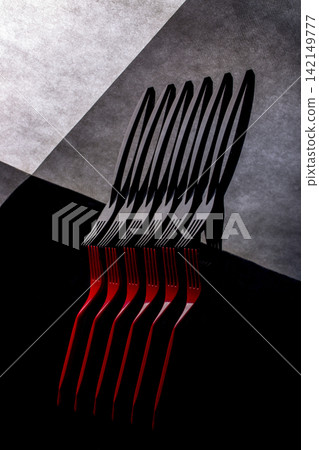 Still life with red and black forks Still life with red and black forks 142149777