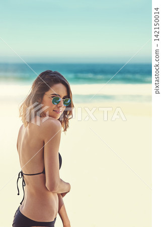 Woman, sunglasses and bikini on beach at sea for holiday adventure or vacation on tropical island, travel or summer. Female person, happiness and weekend paradise in Miami or explore, relax or trip Woman, sunglasses and bikini on beach at sea for holiday adventure or vacation on tropical island, travel or summer. Female person, happiness and weekend paradise in Miami or explore, relax or trip 142150014