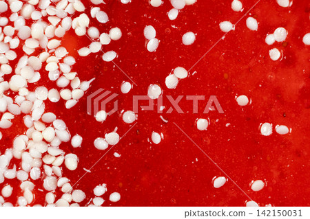 Top view of delicious red strawberry cake topping with white sprinkles Top view of delicious red strawberry cake topping with white sprinkles 142150031