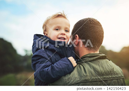 Dad, kid and walking in nature with support, happy face and bonding in outdoor garden. Father, son and playful adventure in backyard for growth, child development and fun with love, smile and care. Dad, kid and walking in nature with support, happy face and bonding in outdoor garden. Father, son and playful adventure in backyard for growth, child development and fun with love, smile and care. 142150423
