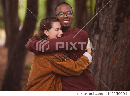 Love, hug and couple together in outdoor for camping in wilderness on anniversary date in Norway, countryside. Interracial people, travel and happiness on vacation in forest for peace and adventure. Love, hug and couple together in outdoor for camping in wilderness on anniversary date in Norway, countryside. Interracial people, travel and happiness on vacation in forest for peace and adventure. 142150604