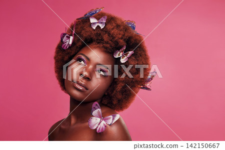 Beauty, makeup and black woman with butterflies in studio with creative, art and fantasy. Cosmetics, thinking and female model from Nigeria with insects for facial cosmetology by pink background. Beauty, makeup and black woman with butterflies in studio with creative, art and fantasy. Cosmetics, thinking and female model from Nigeria with insects for facial cosmetology by pink background. 142150667