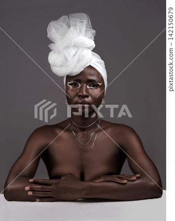Portrait, wrap and black woman with makeup, skincare or confidence in studio on grey background. Beauty, glow or proud African model with traditional outfit, eyeshadow cosmetics or creative necklace 142150679