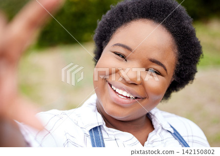 Selfie, African and woman in countryside with smile, summer and fun or content creation for social media. Female person, park and happy for holiday, vacation or break in travel, tourism and adventure Selfie, African and woman in countryside with smile, summer and fun or content creation for social media. Female person, park and happy for holiday, vacation or break in travel, tourism and adventure 142150802