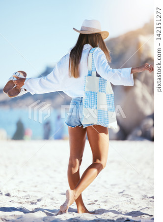Travel, beach and woman by ocean walking for summer vacation, holiday and tropical island. Relax, nature and back of person with shoes, hat and fashion at sea, sunshine and adventure in Hawaii Travel, beach and woman by ocean walking for summer vacation, holiday and tropical island. Relax, nature and back of person with shoes, hat and fashion at sea, sunshine and adventure in Hawaii 142151277