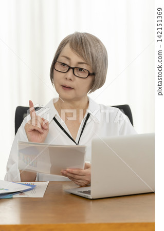 Senior women working in an office Senior women working in an office 142151369