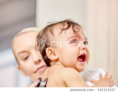 Sick baby, crying and medical woman with stethoscope for check up, healthcare and illness in family clinic. Child, female physician and hospital bed for upset kid, pediatrician and unwell infant Sick baby, crying and medical woman with stethoscope for check up, healthcare and illness in family clinic. Child, female physician and hospital bed for upset kid, pediatrician and unwell infant 142151437