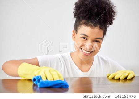 Black woman, cleaning and portrait for counter in home, maid and disinfection for hygiene. Female person, dust and fabric or cloth to tidy, wipe bacteria and gloves to protect from germs or dirt Black woman, cleaning and portrait for counter in home, maid and disinfection for hygiene. Female person, dust and fabric or cloth to tidy, wipe bacteria and gloves to protect from germs or dirt 142151476