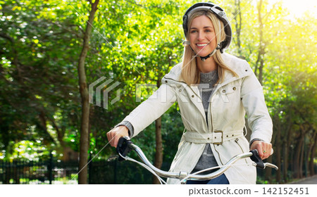 Portrait, woman and smile with bicycle in forest for hobby, adventure and leisure as fitness routine in Australia. Happy, outdoor and woods with exercise or workout in nature, peace and joy. Portrait, woman and smile with bicycle in forest for hobby, adventure and leisure as fitness routine in Australia. Happy, outdoor and woods with exercise or workout in nature, peace and joy. 142152451