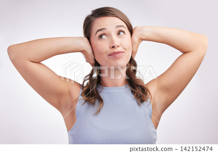 Noise, woman and cover ears for secret, gossip or thinking of hearing in studio isolated on white background. Sound, block and girl with silence to ignore for relax, peace or calm model not listening Noise, woman and cover ears for secret, gossip or thinking of hearing in studio isolated on white background. Sound, block and girl with silence to ignore for relax, peace or calm model not listening 142152474