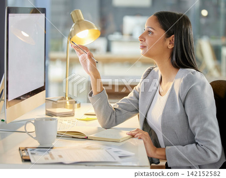 Businesswoman, working late and computer in office as copywriting in agency on deadline for employer. Female person, freelancer and professional in workplace by night lamp, technology and notebook Businesswoman, working late and computer in office as copywriting in agency on deadline for employer. Female person, freelancer and professional in workplace by night lamp, technology and notebook 142152582