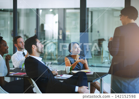 Business, presentation and woman in boardroom for meeting with team, coaching or corporate training. Group, learning and listening to speaker with ideas for leadership and project management Business, presentation and woman in boardroom for meeting with team, coaching or corporate training. Group, learning and listening to speaker with ideas for leadership and project management 142152598