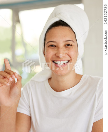 Woman, beauty and cream on nose in morning for portrait, skin and funny with wellness in home bathroom. Girl, person and serum for dermatology, laugh and moisturizer for face with routine in Naples Woman, beauty and cream on nose in morning for portrait, skin and funny with wellness in home bathroom. Girl, person and serum for dermatology, laugh and moisturizer for face with routine in Naples 142152726