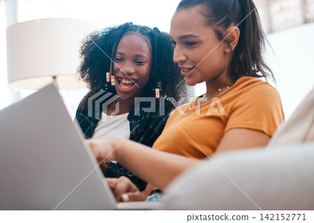 Woman, child and laptop with smile at house for acceptance at private school, scholarship and education. Happy, mother and girl on sofa with positive news, email and online learning for knowledge Woman, child and laptop with smile at house for acceptance at private school, scholarship and education. Happy, mother and girl on sofa with positive news, email and online learning for knowledge 142152771