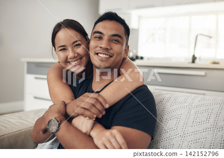 Portrait, home and hug with couple, relax and happiness with love or bonding together in lounge. Face, apartment or man with woman or embrace with romance or relationship with marriage, care or trust Portrait, home and hug with couple, relax and happiness with love or bonding together in lounge. Face, apartment or man with woman or embrace with romance or relationship with marriage, care or trust 142152796