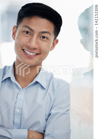 Asian business man, smile and arms crossed in portrait by window in modern office with confidence. entrepreneur, person and happy with reflection by glass, startup or creative media agency in Taiwan Asian business man, smile and arms crossed in portrait by window in modern office with confidence. entrepreneur, person and happy with reflection by glass, startup or creative media agency in Taiwan 142152806